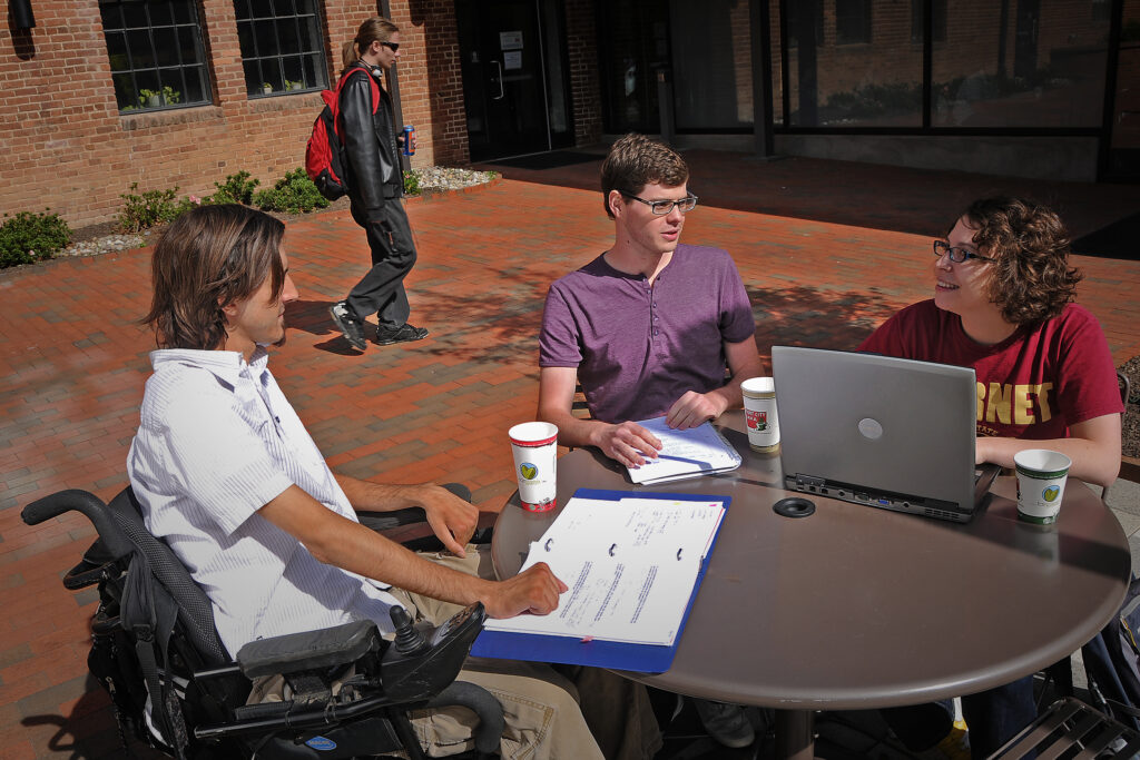 Students gather in front of Park Shops - Register with DSO